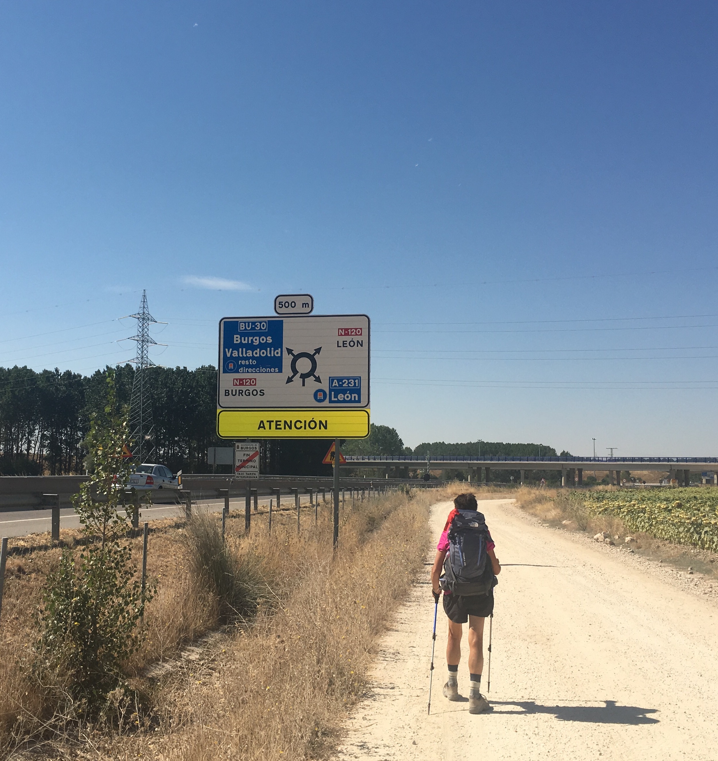 Camino parallel to freeway