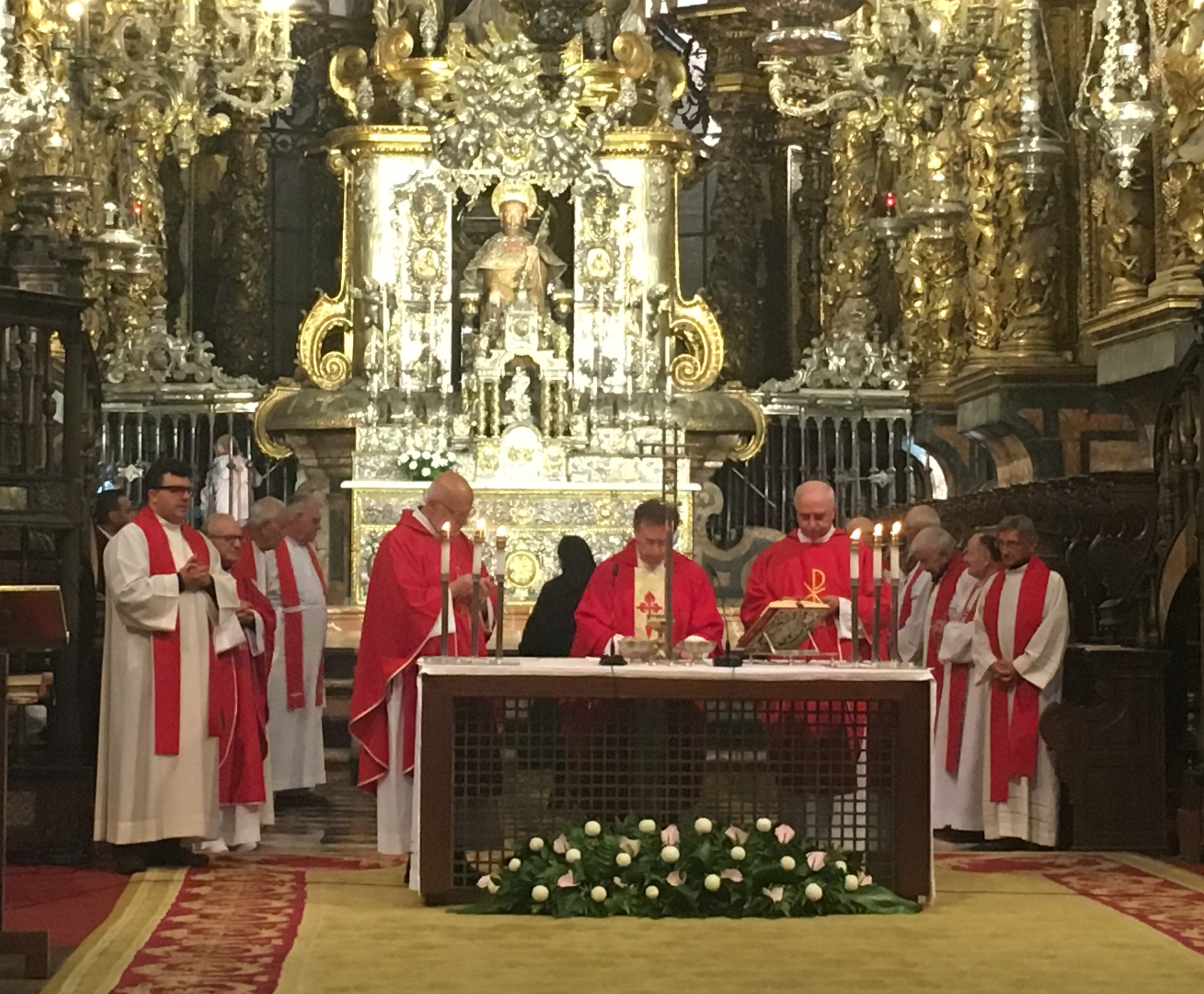 9 Priests concelebrating Mass